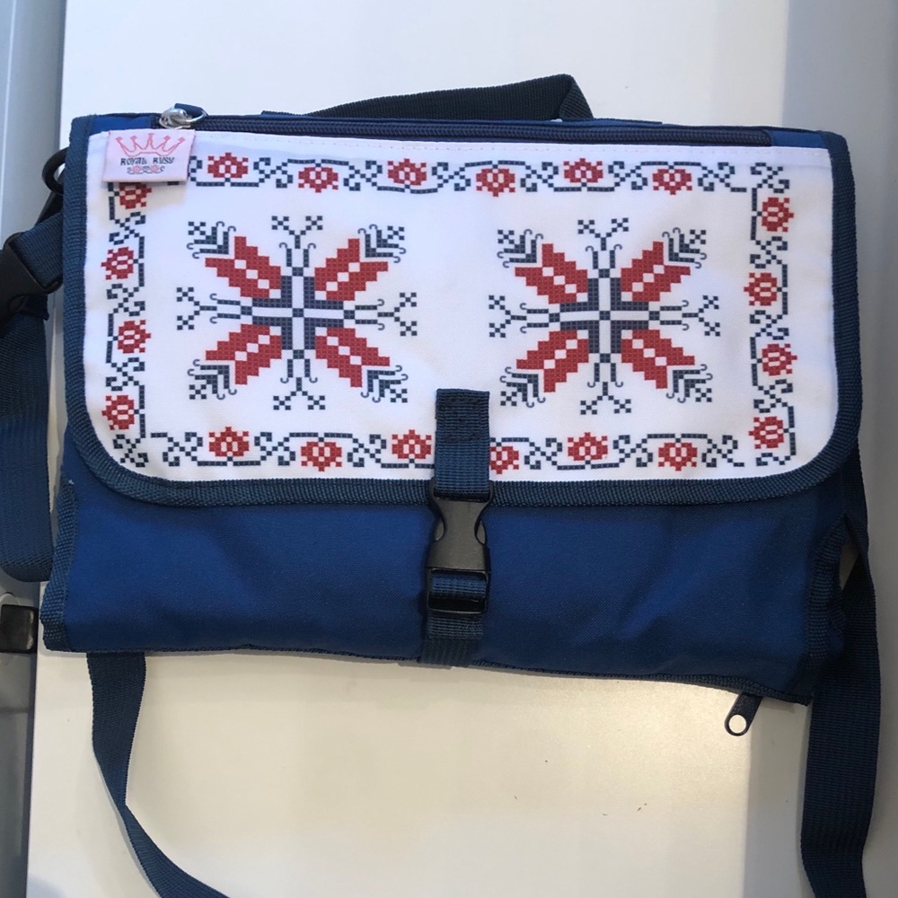 Diaper changing pad clutch